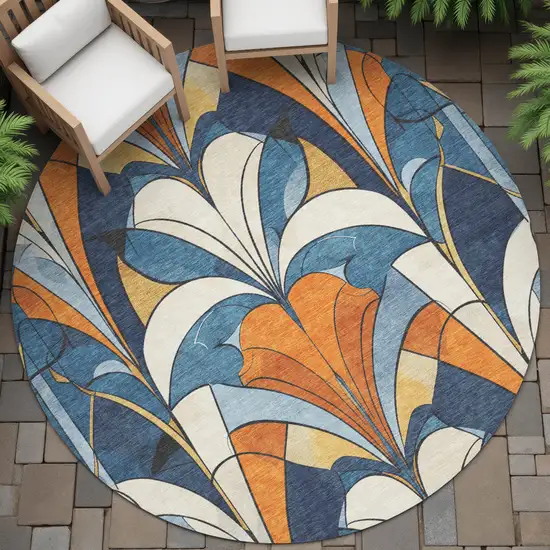 8' Blue Orange And Ivory Round Geometric Washable Indoor Outdoor Area Rug Photo 9