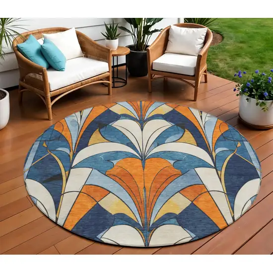 8' Blue Orange And Ivory Round Geometric Washable Indoor Outdoor Area Rug Photo 2