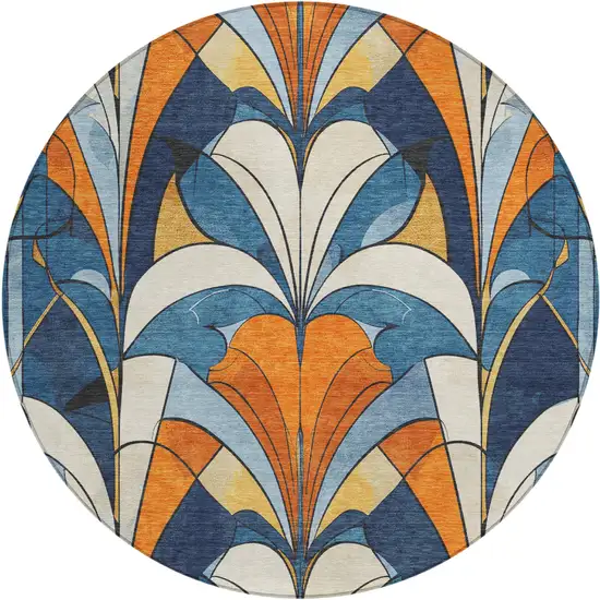 8' Blue Orange And Ivory Round Geometric Washable Indoor Outdoor Area Rug Photo 1