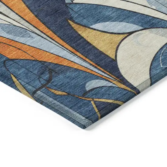 8' Blue Orange And Ivory Round Geometric Washable Indoor Outdoor Area Rug Photo 5