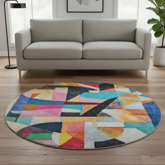 8' Blue Orange And Pink Abstract Washable Round Rug With UV Protection Photo 2