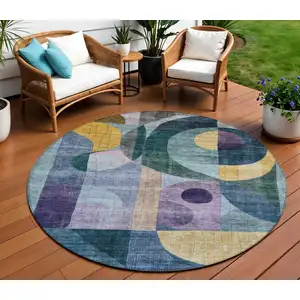 Photo of 8' Blue Purple And Copper Round Abstract Washable Indoor Outdoor Area Rug