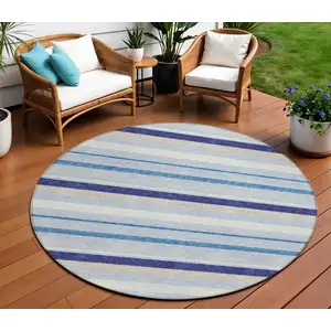 Photo of 8' Blue Purple And Gray Round Striped Washable Indoor Outdoor Area Rug
