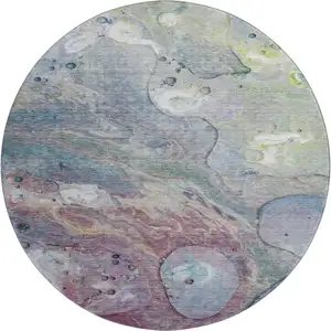 Photo of 8' Blue Purple And Green Abstract Washable Round Rug With UV Protection