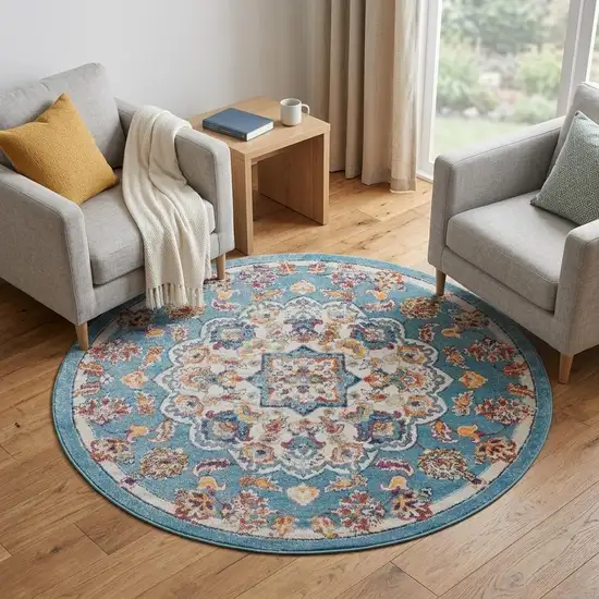 6' Ivory Blue and Orange Medallion Power Loom Round Rug Photo 1