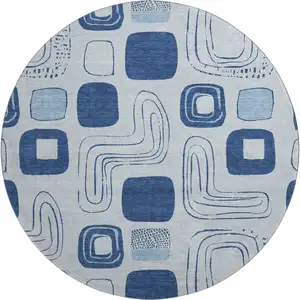 Photo of 8' Blue Sky Blue And Ivory Geometric Washable Round Rug With UV Protection