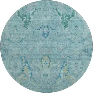 Photo of 8' Blue Teal And Artichoke Green Floral Washable Round Rug With UV Protection