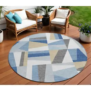 Photo of 8' Blue Wheat And Ivory Round Geometric Washable Indoor Outdoor Area Rug