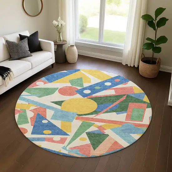 8' Blue Yellow And Coral Geometric Washable Round Rug With UV Protection Photo 4