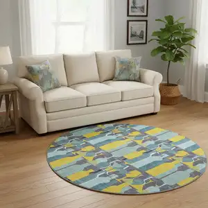 Photo of 8' Blue Yellow And Green Geometric Washable Round Rug With UV Protection