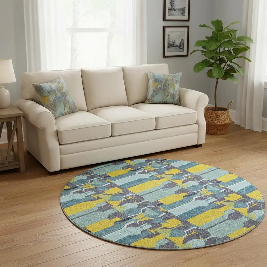 8' Blue Yellow And Green Geometric Washable Round Rug With UV Protection Photo 1