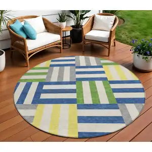 Photo of 8' Blue Yellow And Green Round Geometric Washable Indoor Outdoor Area Rug