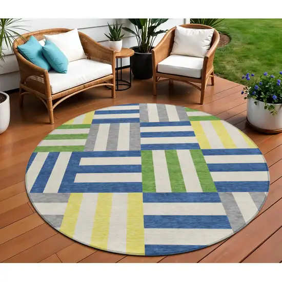 8' Blue Yellow And Green Round Geometric Washable Indoor Outdoor Area Rug Photo 1