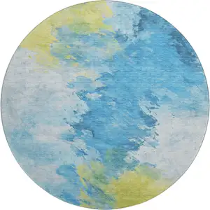 Photo of 8' Blue Yellow And Ivory Abstract Washable Round Rug With UV Protection