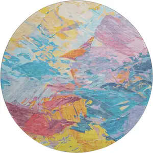 Photo of 8' Blue Yellow And Pink Abstract Washable Round Rug With UV Protection