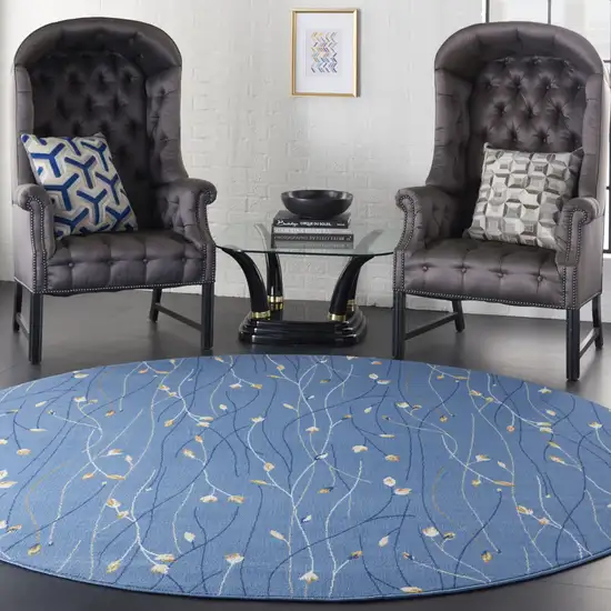 8' Blue and Beige Round Floral Power Loom Area Rug Photo 5
