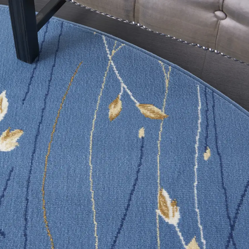 8' Blue and Beige Round Floral Power Loom Area Rug Photo 6