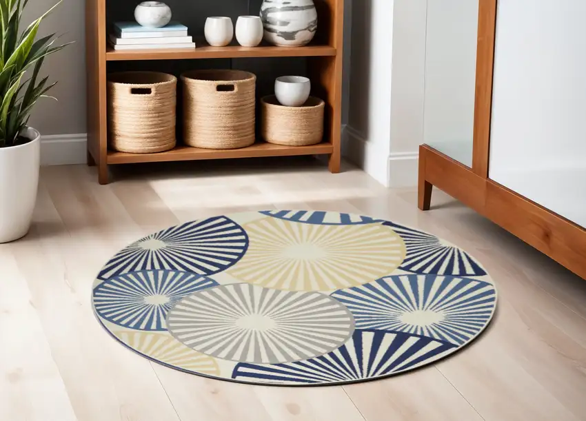 5' Blue and Beige Round Geometric Power Loom Area Rug Photo 1
