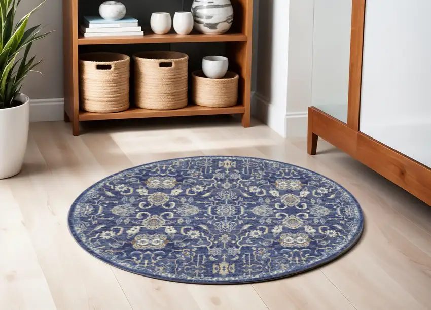 5' Blue and Gold Round Oriental Power Loom Area Rug Photo 1