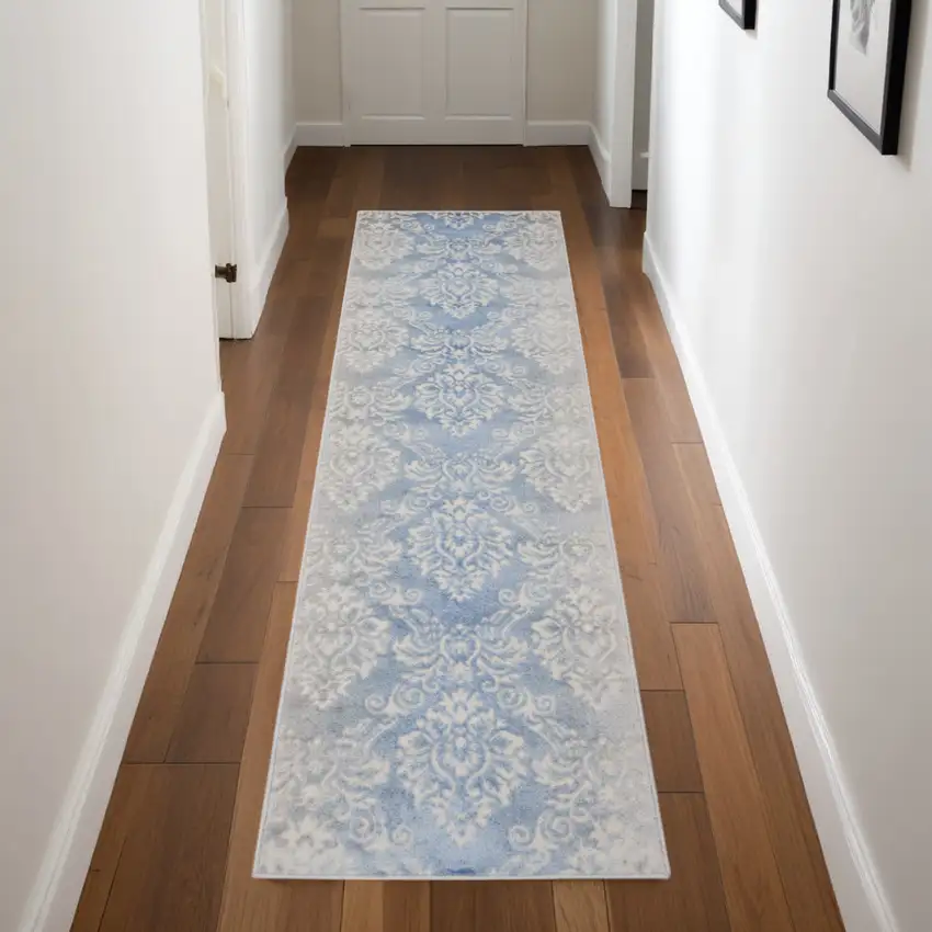 8' Blue and Ivory Damask Distressed Non Skid Runner Rug Photo 1