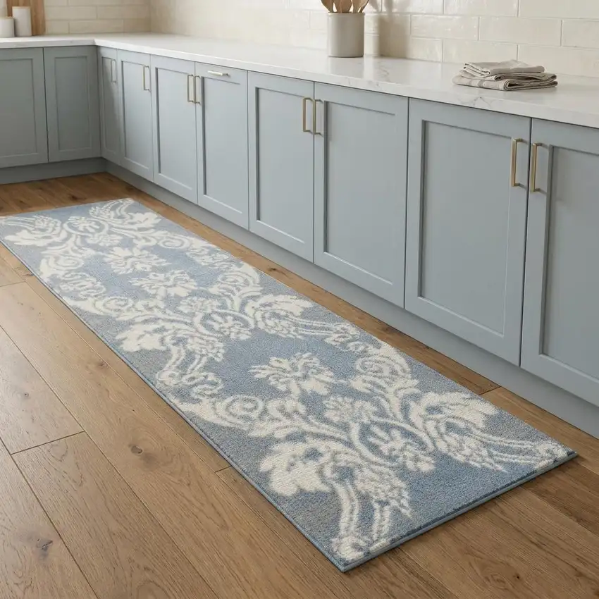8' Blue and Ivory Damask Distressed Non Skid Runner Rug Photo 1