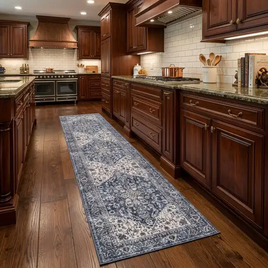 8' Blue and Ivory Floral Power Loom Distressed Washable Runner Rug Photo 1