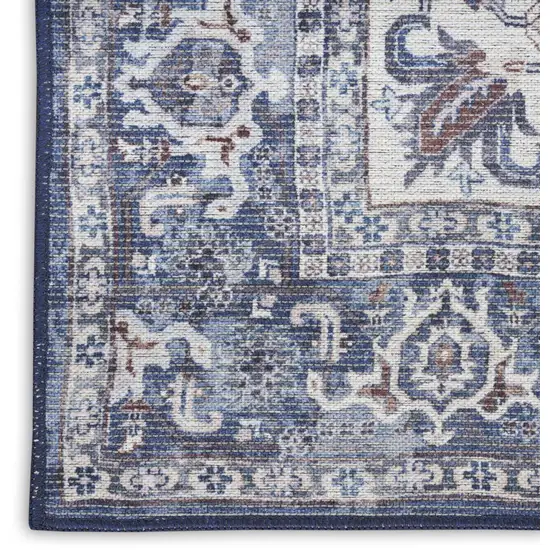 8' Blue and Ivory Floral Power Loom Distressed Washable Runner Rug Photo 9