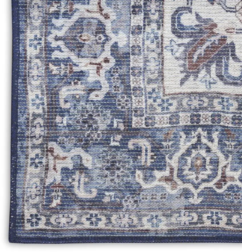 8' Blue and Ivory Floral Power Loom Distressed Washable Runner Rug Photo 9