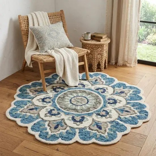5' Blue and Ivory Round Wool Floral Hand Tufted Area Rug Photo 1