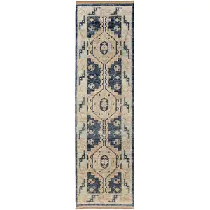 Photo of 12' Blue and Ivory Wool Geometric Hand Knotted Runner Rug With Fringe