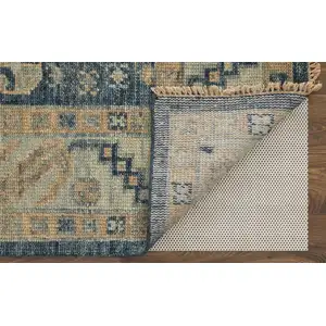 Photo of 8' Blue and Ivory Wool Geometric Hand Knotted Runner Rug With Fringe