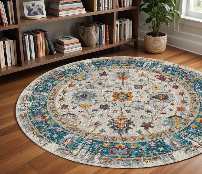 7' Blue and Orange Floral Power Loom Round Rug Photo 1