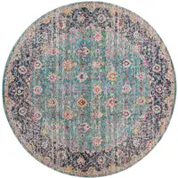 Photo of 6' Blue and Orange Round Floral Power Loom Distressed Area Rug