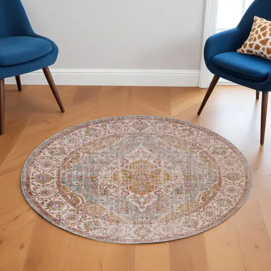 6' Sea Blue and Orange Oriental Power Loom Worn Faded Round Rug Photo 1