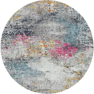 Photo of 7' Blue and Pink Round Abstract Power Loom Area Rug