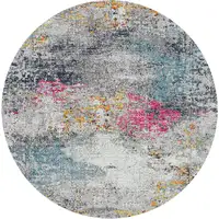 Photo of 7' Blue and Pink Round Abstract Power Loom Area Rug