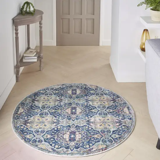 4' Blue and Yellow Floral Distressed Non Skid Round Rug Photo 6