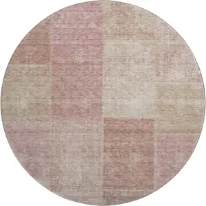 Photo of 8' Blush And Beige Patchwork Washable Round Rug With UV Protection