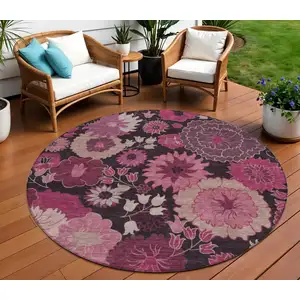 Photo of 8' Blush And Black Round Floral Washable Indoor Outdoor Area Rug