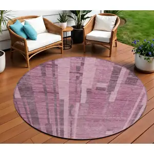 Photo of 8' Blush And Brown Round Striped Washable Indoor Outdoor Area Rug