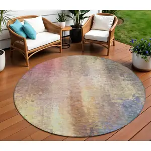 Photo of 8' Blush And Gold Round Abstract Washable Indoor Outdoor Area Rug