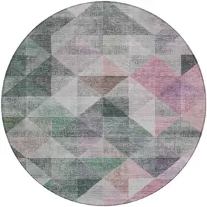 Photo of 8' Blush And Green Round Geometric Washable Indoor Outdoor Area Rug