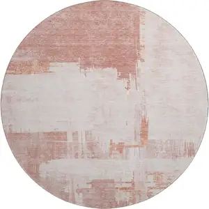 Photo of 8' Blush And Ivory Abstract Washable Round Rug With UV Protection