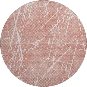 Photo of 8' Blush And Ivory Abstract Washable Round Rug With UV Protection