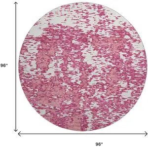 Photo of 8' Blush And Ivory Abstract Washable Round Rug With UV Protection