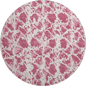 Photo of 8' Blush And Ivory Abstract Washable Round Rug With UV Protection