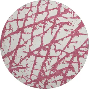 Photo of 8' Blush And Ivory Abstract Washable Round Rug With UV Protection