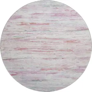 Photo of 8' Blush And Ivory Abstract Washable Round Rug With UV Protection