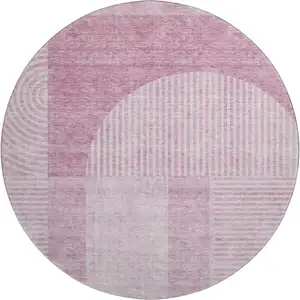 Photo of 8' Blush And Ivory Geometric Washable Round Rug With UV Protection
