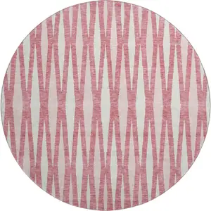 Photo of 8' Blush And Ivory Geometric Washable Round Rug With UV Protection